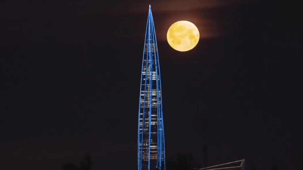 Mesmerizing view of the moon above the Lakhta Center skyscraper
