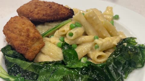 Collard greens that accidentally grew on my porch, with mac & cheese and cod