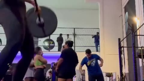 Weightlifter Drops Barbell on Her Back