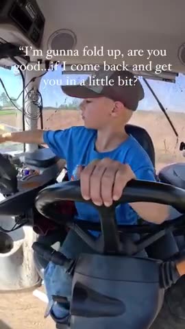 Just a kid operating a tractor