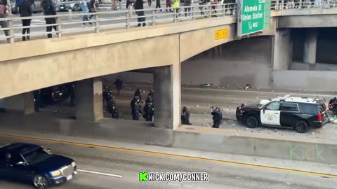 Anti-American rioter hits police officer in the face with rock thrown from bridge