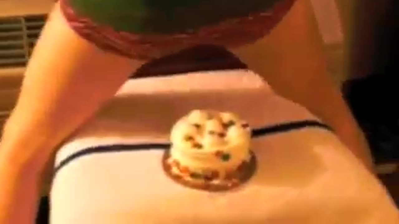 Sitting on Cake