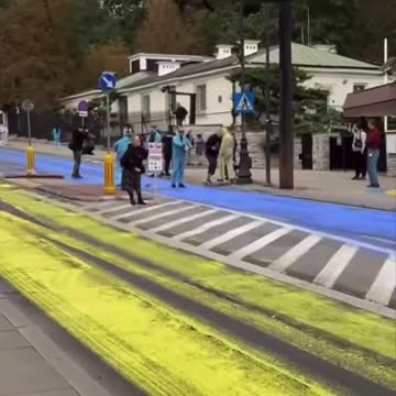 Ukrainian Vandals Pour Paint on Russian Embassy’s Asphalt in Poland