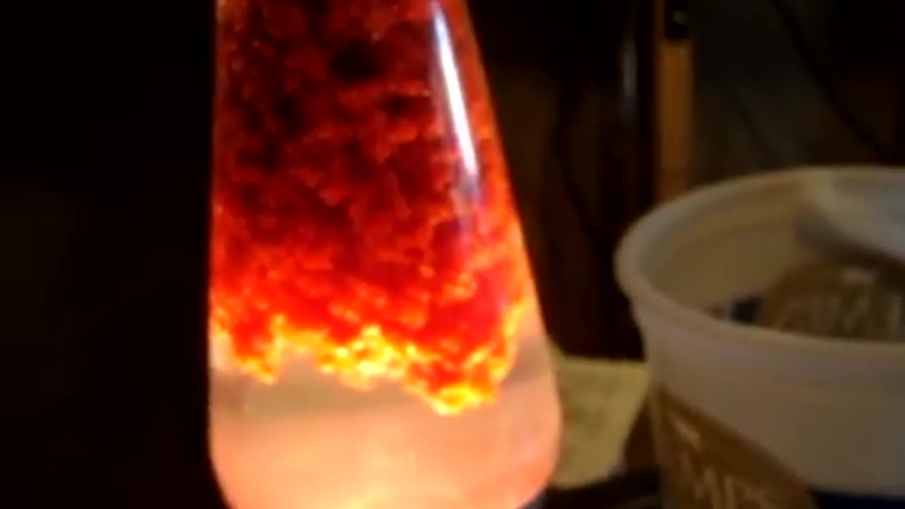 Lava lite smashed on concrete & what a shook up lava lite looks like