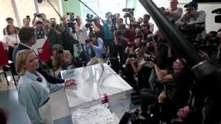 Poland's presidential candidates cast votes in tight runoff race