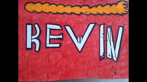 Graffiti painted inside red background with flame above