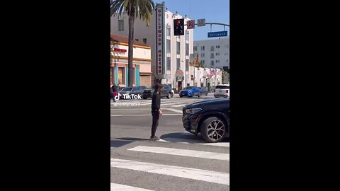 Lone protester blocks cars and is confronted