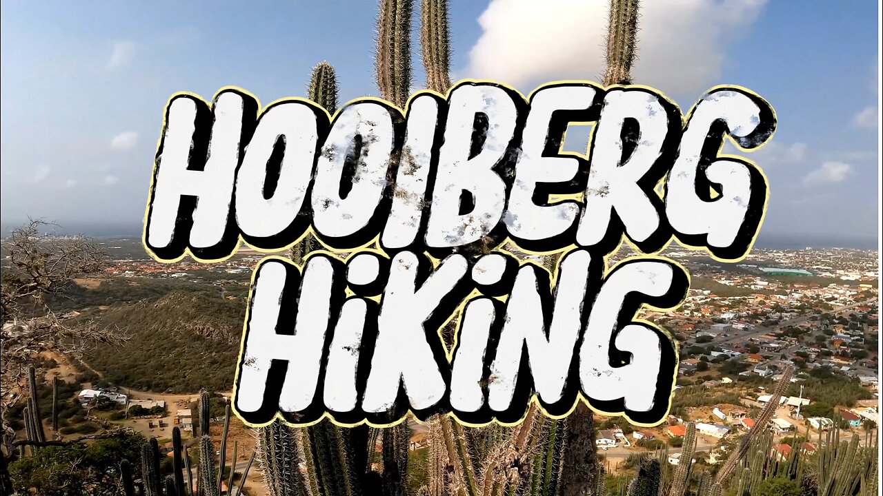 Experience the Thrilling Hike to the Top of Hooiberg Mountain