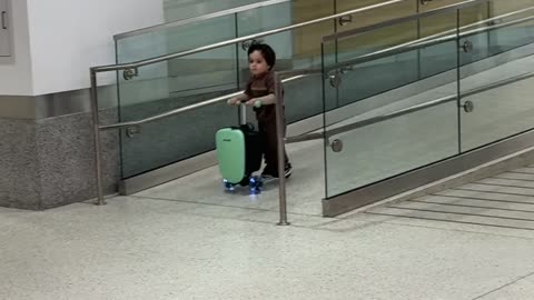 Toddler On Airport Scooter Crashes Into Other Traveler