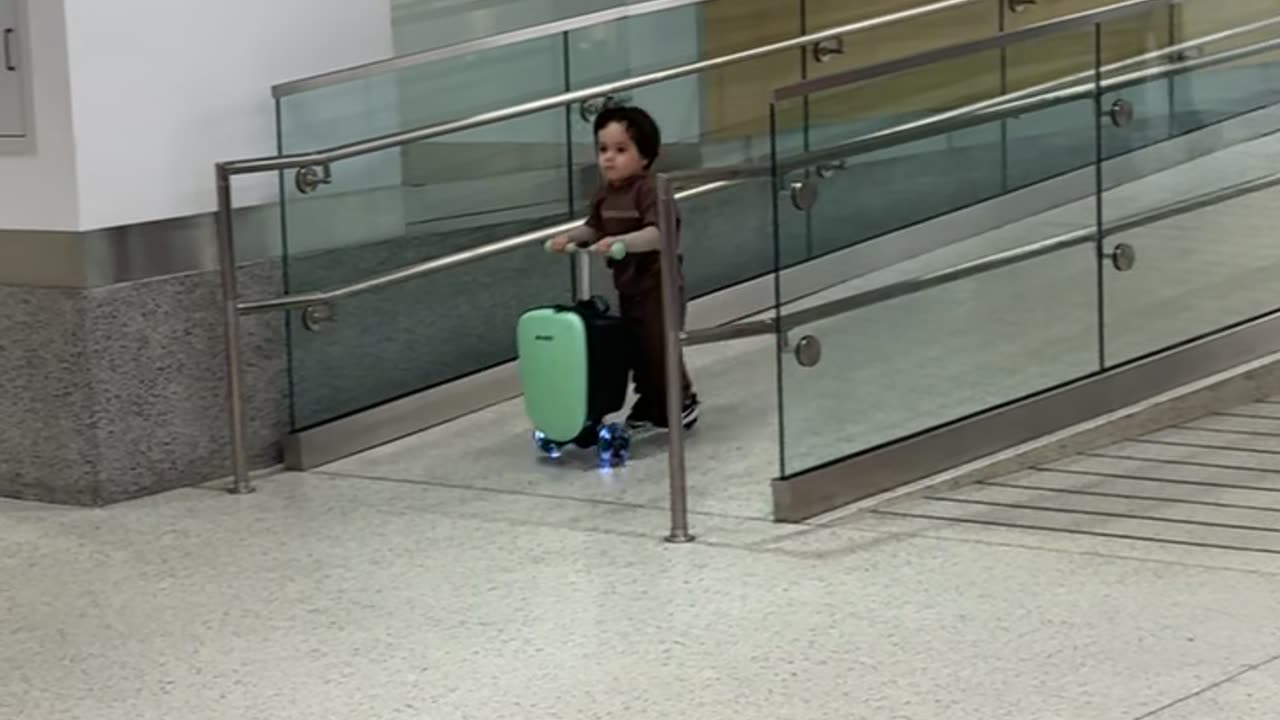 Toddler On Airport Scooter Crashes Into Other Traveler