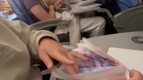 Flying a Paper Airplane on an Airplane