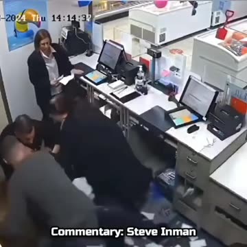 Hero steps in and takes out an armed robber