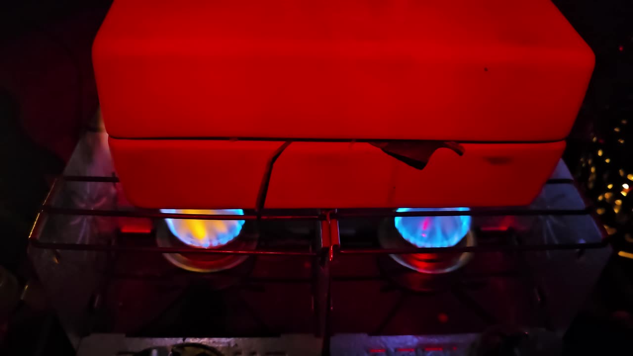 Cooking a hot meal in a ceramic block over a folding alcohol stove