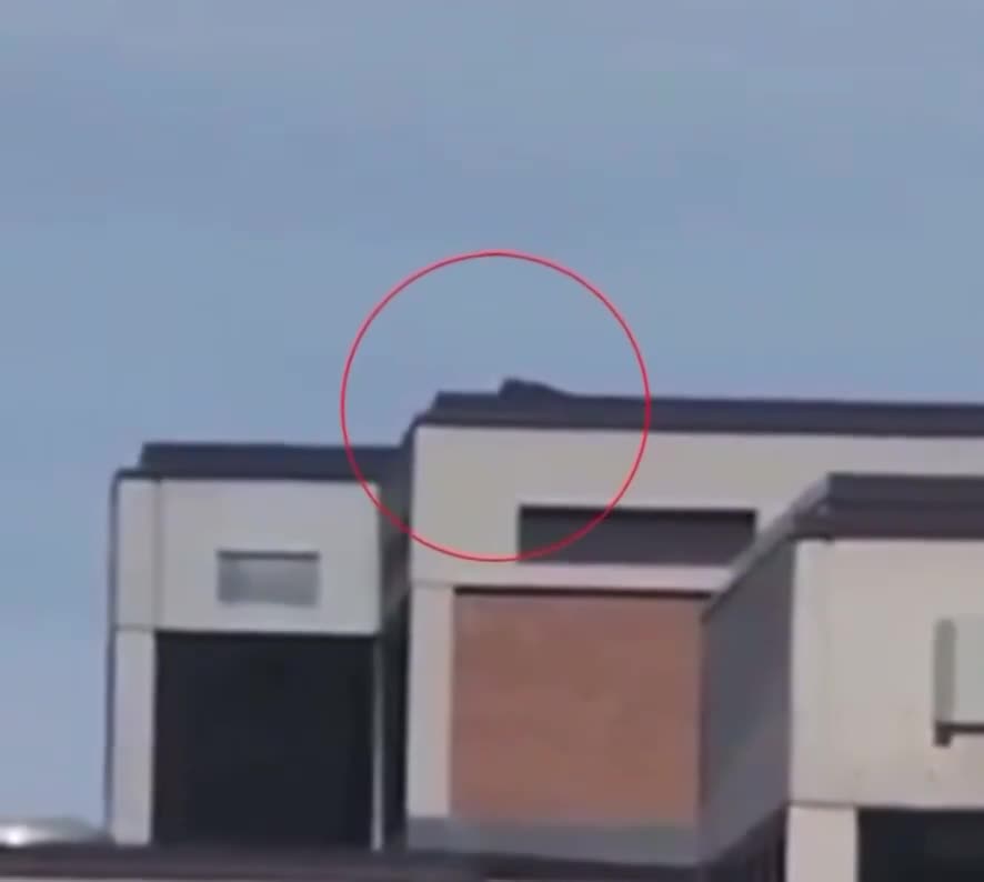 Video emerges from Utah Valley University showing what looks like a shooter lying down on a roof