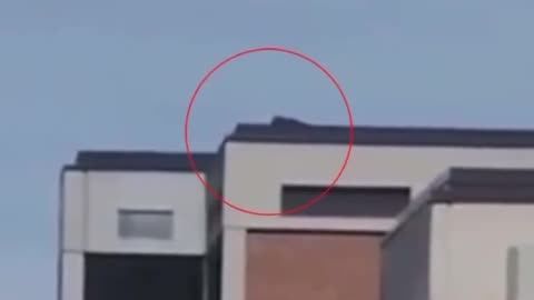 Video emerges from Utah Valley University showing what looks like a shooter lying down on a roof