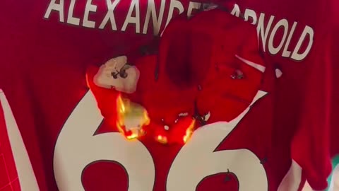 A Liverpool fan is BURNING his Trent Alexander Arnold jersey