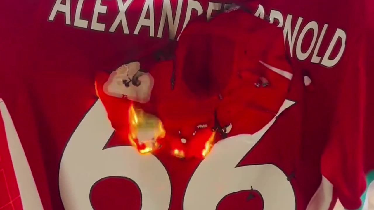 A Liverpool fan is BURNING his Trent Alexander Arnold jersey