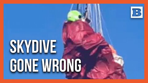 Skydiver Left Hanging by a Thread from Powerlines