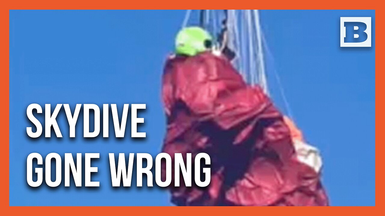 Skydiver Left Hanging by a Thread from Powerlines