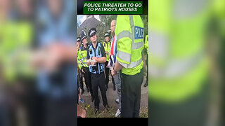 Heated exchange between patriots and police where one officer tells man he will see him at his home