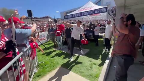 Man Grabs Trump Hats Charlie Kirk Booth After Shooting Tosses Into Crowd Security Chases Him Away