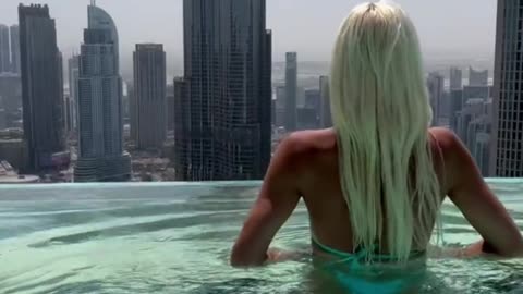 Swimming at a rooftop pool in Bangkok