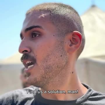 A Palestinian man speaks with anguish about the repeated bombing of his home