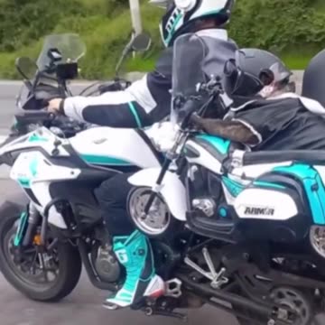 The dog has his own motorcycle.. 😎