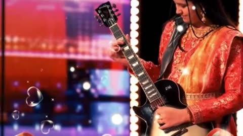 AGT - 10-year-old girl play guitar like Elvis Presley