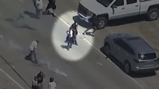 A violent rioter was seen shooting at federal agents