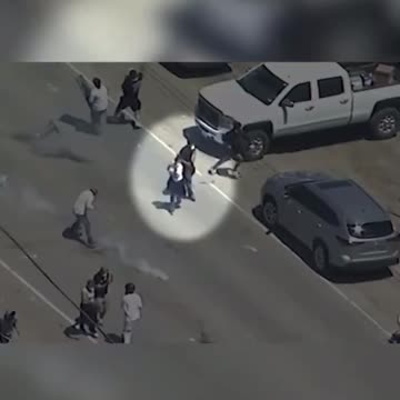 A violent rioter was seen shooting at federal agents