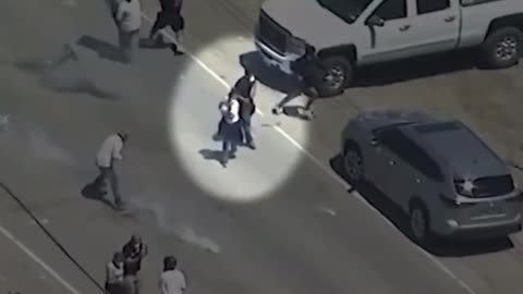 A violent rioter was seen shooting at federal agents