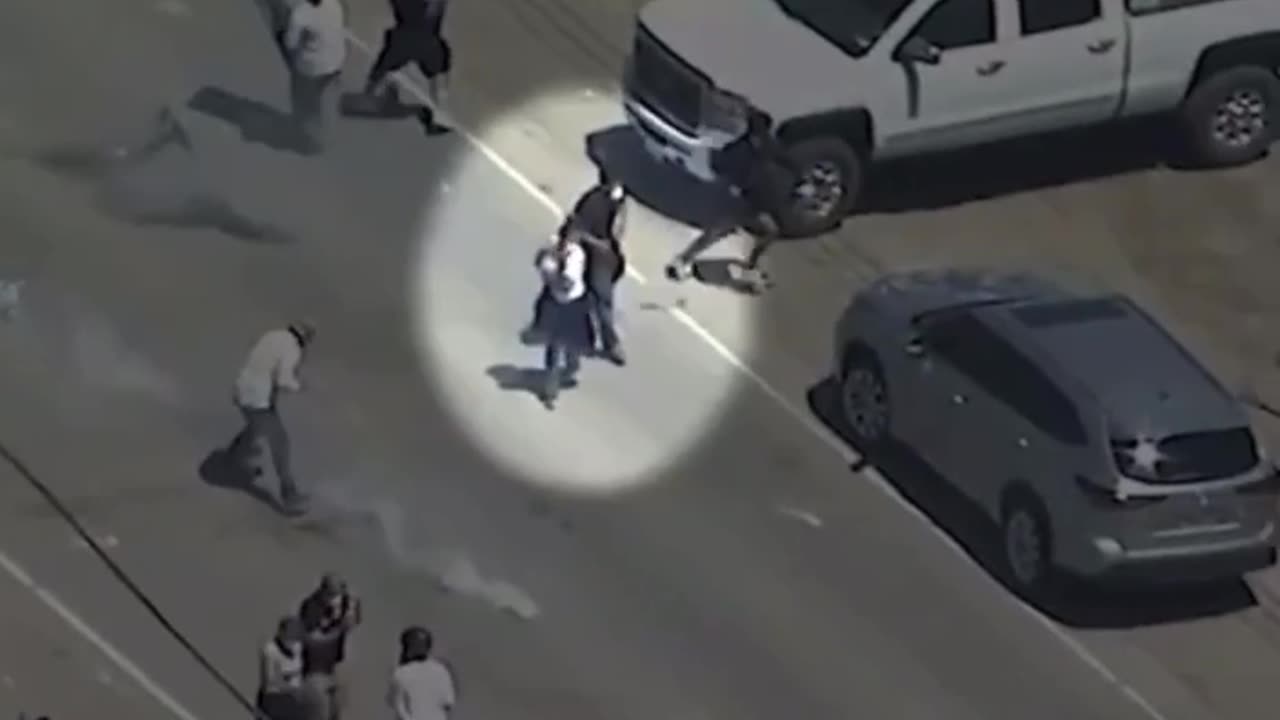 A violent rioter was seen shooting at federal agents