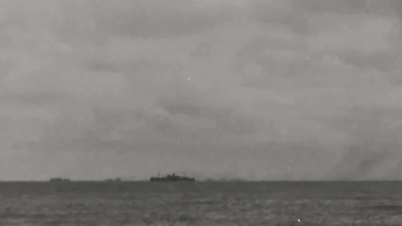 HMS Jervis Bay taking fire from heavy cruiser Admiral Scheer while escorting Convoy HX 84
