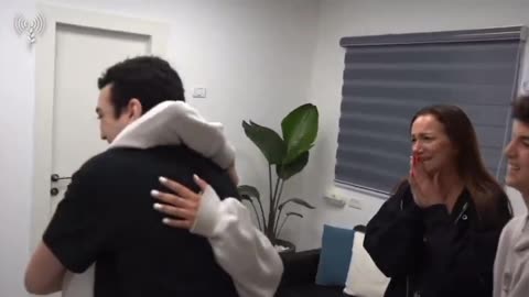The moment hostage Edan Alexander is reunited with his family in America