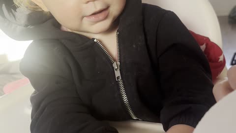 baby and sister play with ball — too cute!