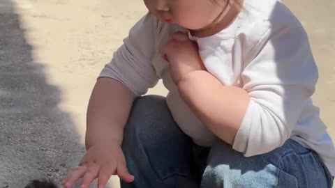 Cute Baby Girl and Baby cat