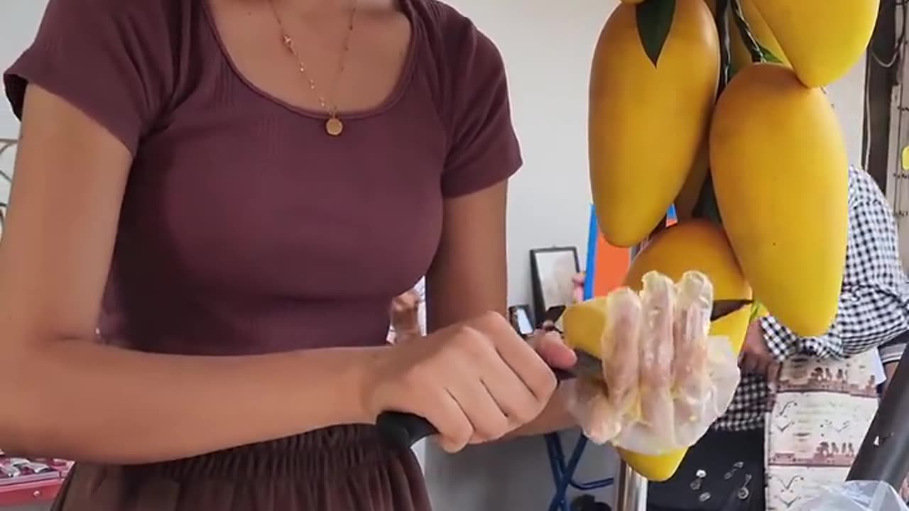 Thailand street food Girl cook Rice with Mango