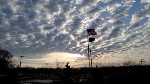 US Flag Waving In A Breeze