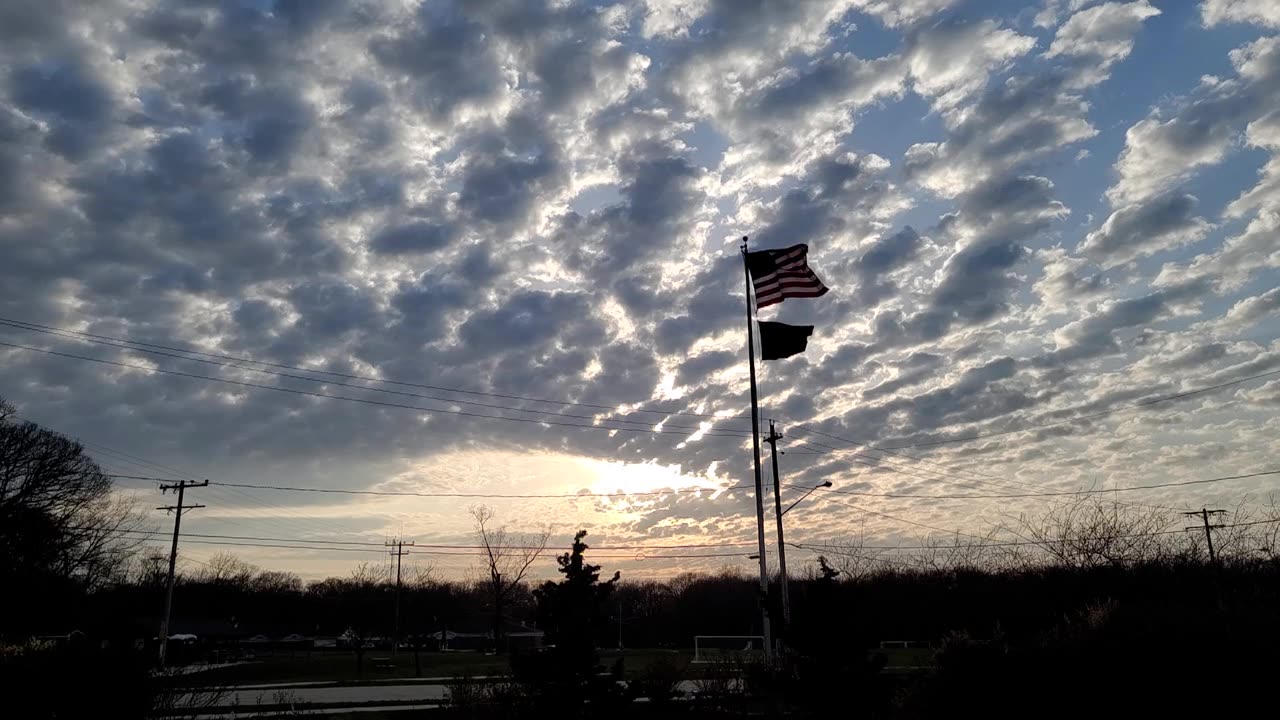 US Flag Waving In A Breeze