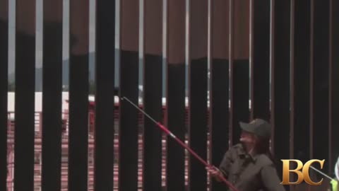 DHS Secretary Noem says entire southern border wall will be painted black