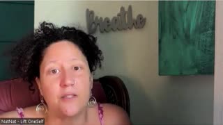Why she has Breath on the wall in her background