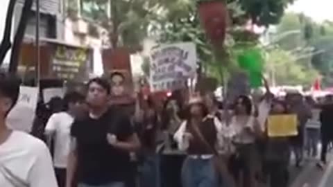 Store windows smashed during a protest against attempts of civilization in Mexico City