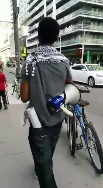 Sometimes You just got to honor the Music of Love and Unity In Public Protests Against Genocide.