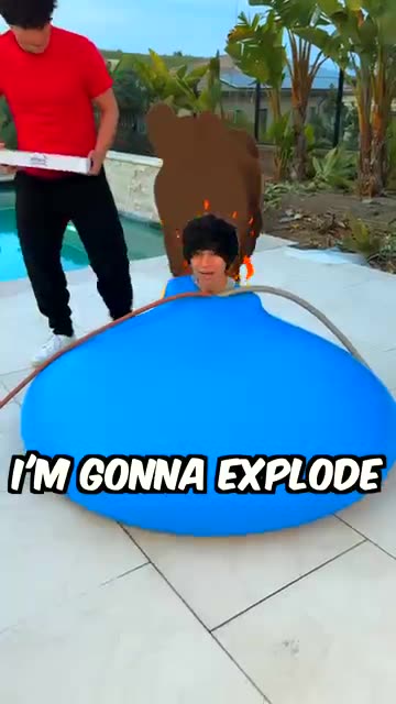 Filling a water balloon with bath bombs.