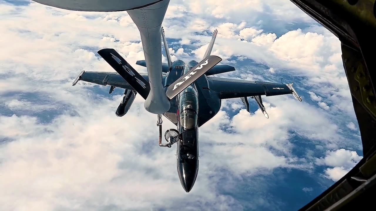 U.S. Air Force Refuels U.S. Navy FA-18 Mid-Flight at RIMPAC