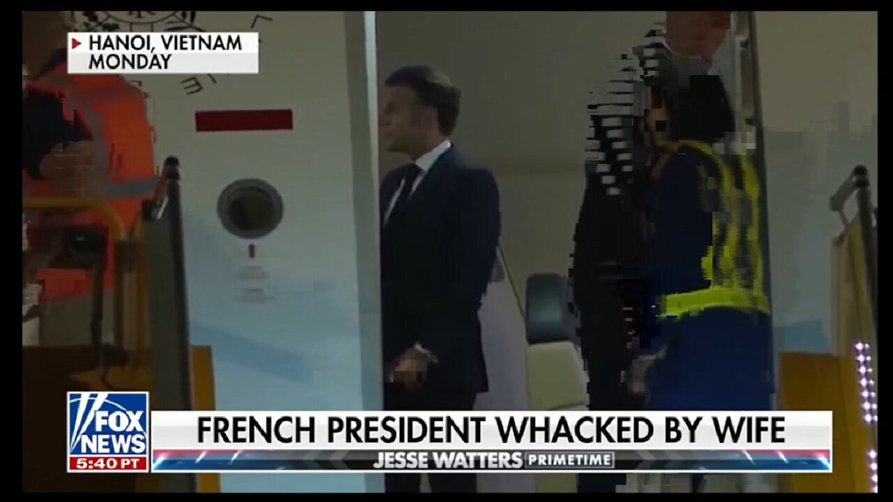 MACRON WHACKED BY HEWIFE