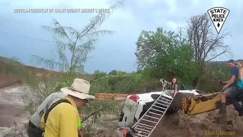 New Mexico State Police officer rescues woman, child, dog from floodwaters