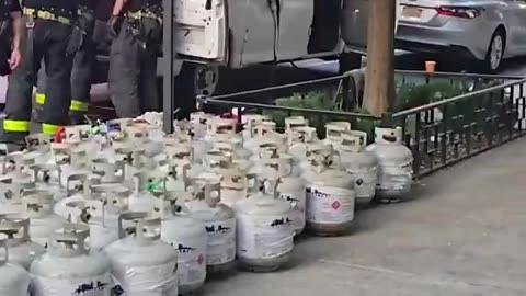NYC Cops pulled over van found dozens of propane tanks, gasoline cans. Driver Took off running