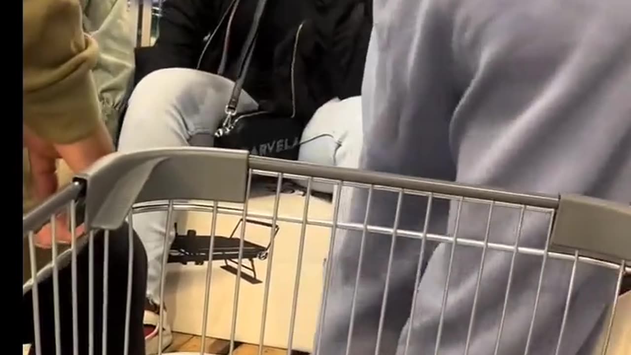 Shoppers fight over a Pilates machine inside an Aldi store in the UK.